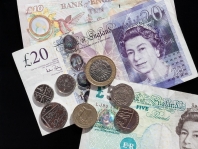 Pound falls on British statistics