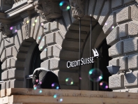 Credit Suisse recorded losses, while ING lowered profits