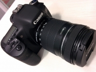 Canon has reduced its annual profit forecast on weak demand for digital cameras