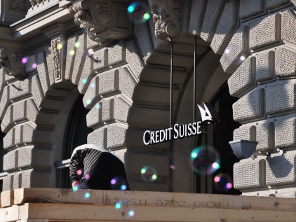 Credit Suisse recorded losses, while ING lowered profits